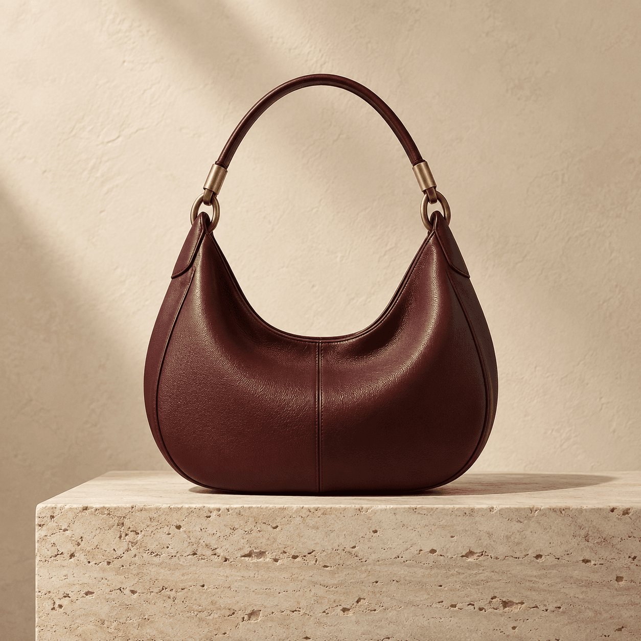 Amira Sculpted shoulder bag in Oxblood
